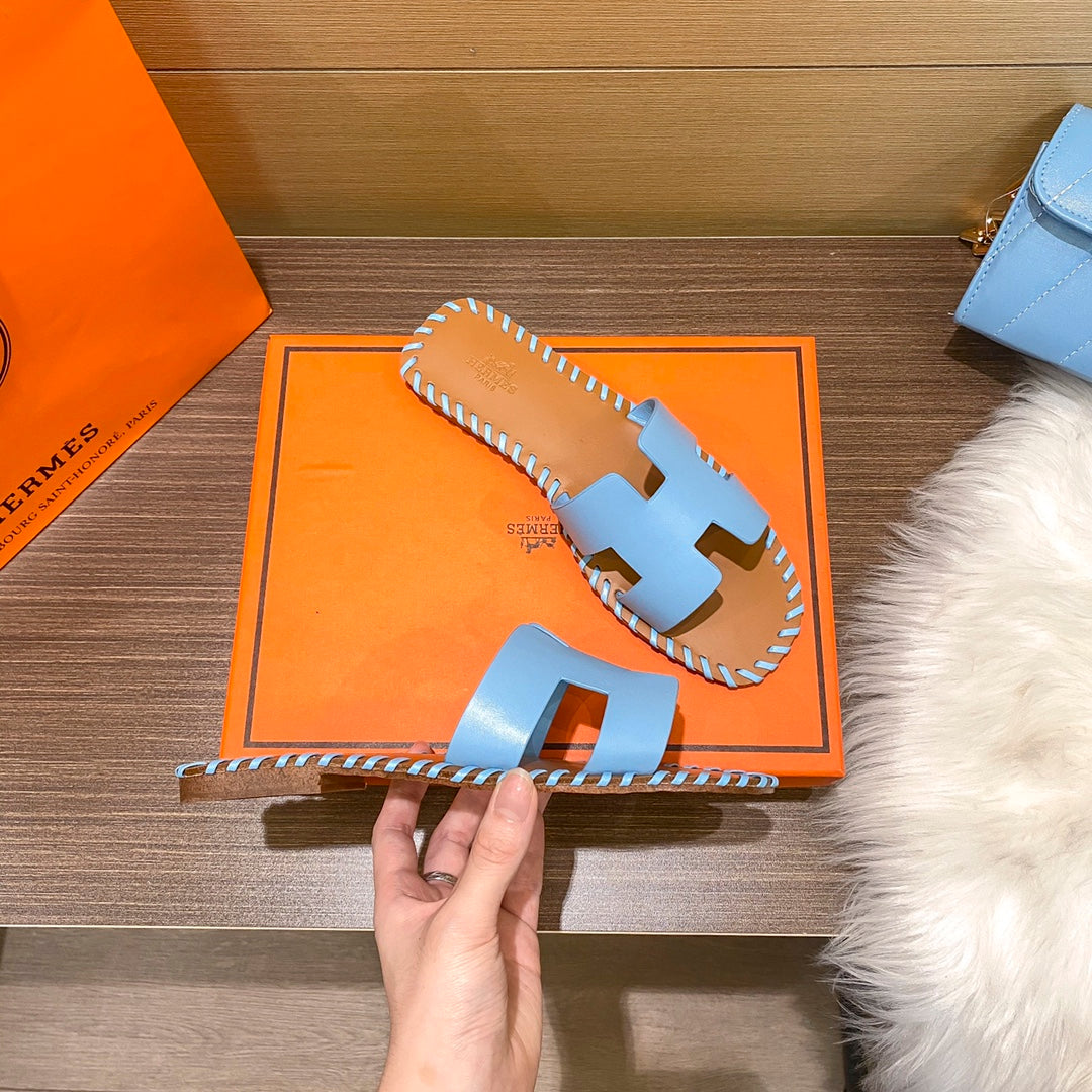 New H new woven slippers