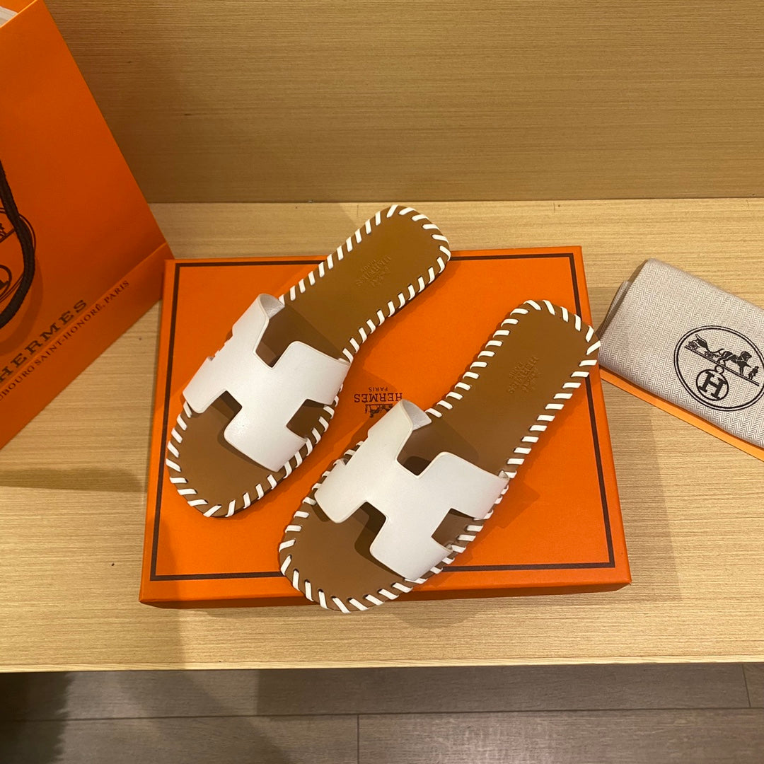 New H new woven slippers
