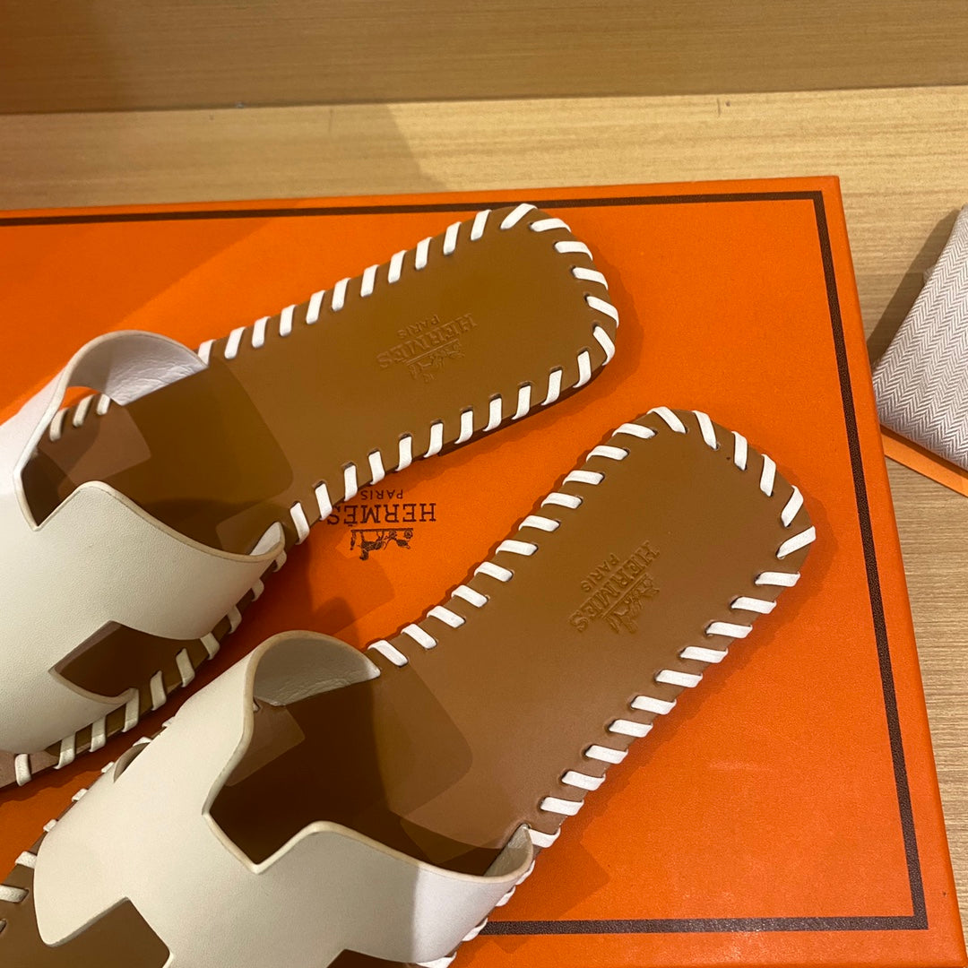 New H new woven slippers